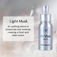 Load image into Gallery viewer, A brushed silver car fragrance spray bottle labeled AirVive London, shown beside a white text box describing the Light Musk scent - An uplifting blend of botanicals and minerals, creating a fresh and clean scent.